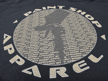 Light Brown and Dark Brown Silhouette PSA Logo on Black Hoodie Close Up Tilted Up Angle View