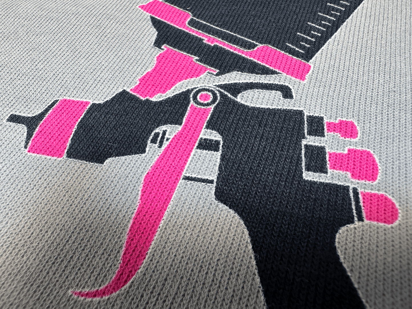 Pink and Black PSA Logo on White Hoodie Close Up Tilted Up Angle View of Paint Gun