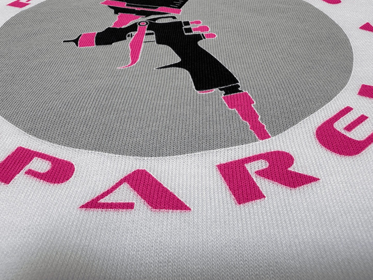 Pink and Black PSA Logo on White Hoodie Close Up of Lettering Tilted Up Angle View